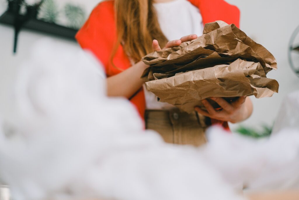 Woman holding packaging materials